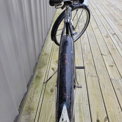 Sale Photo Thumbnail #328: Black Schwinn Speedster men's middleweight with classic cantilever frame, painted fenders, Speedster chainguard, chrome rims, kickstand, Schwinn-style grips and black/white saddle. Honest restoration-project condition with substantial paint loss, surface 
