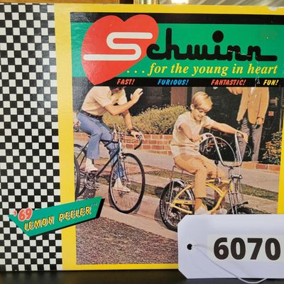 Sale Photo Thumbnail #385: Xonex 1:6 scale die-cast 1969 Schwinn Sting-Ray Lemon Peeler Krate in yellow with molded Styrofoam insert and original Schwinn/Xonex presentation box. Detailed model with classic Krate styling and strong display appeal. Outer carton shows moderate shelf, 