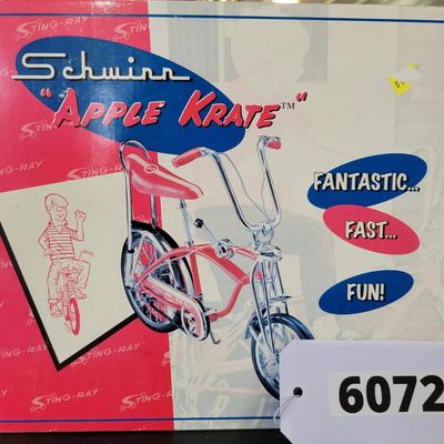 Sale Photo Thumbnail #393: Boxed Xonex 1:6 scale Schwinn Sting-Ray Apple Krate die-cast model in red with molded Styrofoam insert and original presentation carton. Nicely detailed miniature with banana seat, tall bars and Krate-style front end. Model presents well; box shows normal