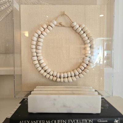 African ivory beads framed