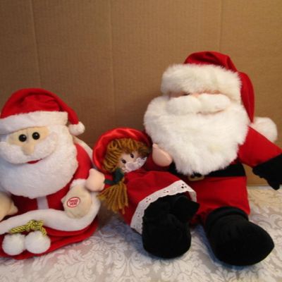 Sale Photo Thumbnail #27: 9" tall Laughing & peek-a-boo Santa takes 3 AA batteries included; 12" Santa with doll sings Jingle Bells & Santa Claus is Coming To Town & We Wish You a Merry Christmas and lights up, takes 2 AA batteries not included; both tested & they work, see pictur