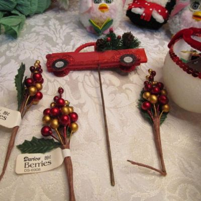 Sale Photo Thumbnail #36: 3 Furies ornaments, 1 wreath, 1 envelope/wrapping paper cutter, truck pick, 3 bead clips wreath hanger, 2  egg nativity ornaments, set of 12 miniature ornaments, Santa hat size Medium, 2 doves with a poem in a burlap bag, 1 snowflake,  see pictures