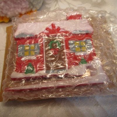 Sale Photo Thumbnail #37: 3 Furies ornaments, 1 wreath, 1 envelope/wrapping paper cutter, truck pick, 3 bead clips wreath hanger, 2  egg nativity ornaments, set of 12 miniature ornaments, Santa hat size Medium, 2 doves with a poem in a burlap bag, 1 snowflake,  see pictures