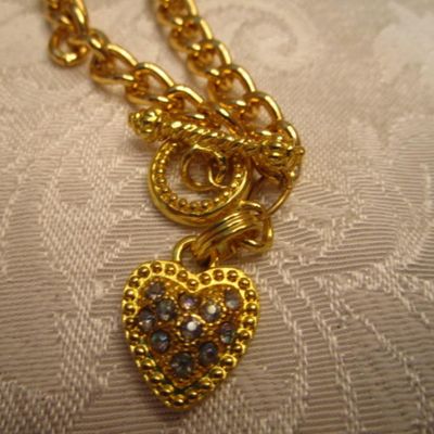 Sale Photo Thumbnail #153: 3 pins, 1 ring, 3 necklaces, 8 pr of pierced earrings, see pictures