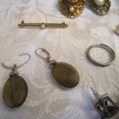 Sale Photo Thumbnail #146: 3 pins, 1 ring, 3 necklaces, 8 pr of pierced earrings, see pictures
