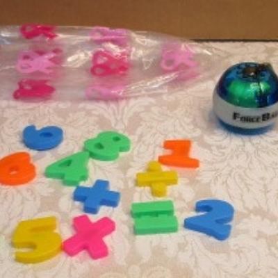 Sale Photo Thumbnail #364: 14" beach ball, 2 recorders, Force Ball (needs a string), Figit spinner, magnetic numbers with plus, times, and equals signs, 1 flying disc with pouch, see pictures
