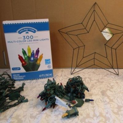 Sale Photo Thumbnail #618: Star wreath frame is 15" across, one new string of multi-color mini lights has 50 bulbs, one new string of clear mini lights has 50 bulbs, new in box 300 multicolor mini lights, 1 new in box string 35 blue mini lights, see pictures