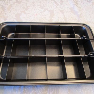 Sale Photo Thumbnail #640: Brownie pan has removable divider and bottom & is 12" x 8", mini bundt pan is 6-1/2" across, steamer pan is 7" across, see pictures 