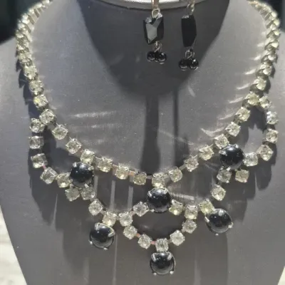 Sale Photo Thumbnail #62: Vintage silver tone Rhinestone swag necklace & Earrings coord.
< Necklace is 100% in tack and original.....hook closure
> black rhinestone earring compliment set