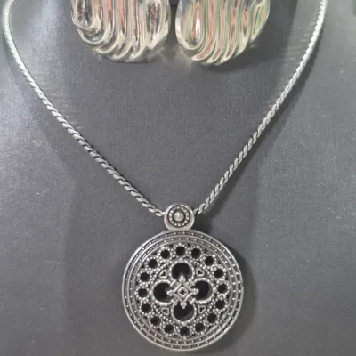 Sale Photo Thumbnail #71: Brighton Pasilic Pendant & Coin Earring for set
> med size Pasilic pendant on 16" chain........Brighton tag still attached NEW
> Earrings pierced, coin style
all excellent