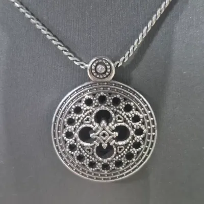 Sale Photo Thumbnail #73: Brighton Pasilic Pendant & Coin Earring for set
> med size Pasilic pendant on 16" chain........Brighton tag still attached NEW
> Earrings pierced, coin style
all excellent