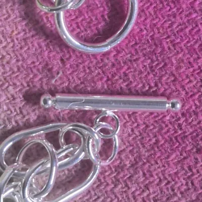 Sale Photo Thumbnail #78: Sterling chain link Toggle Bracelet ~ marked 925
Toggle closure......7.25" long
Marked on circle of toggle