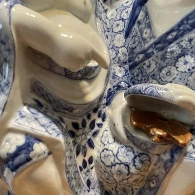 Sale Photo Thumbnail #252: Vintage Chinese Blue & White Immortal HeHe Porcelain Figurine 10.75" Tall & 8" Wide in VG Preowned Condition from an Estate. (Heavy & Very Nicely Designed). $15 Domestic Shipping.