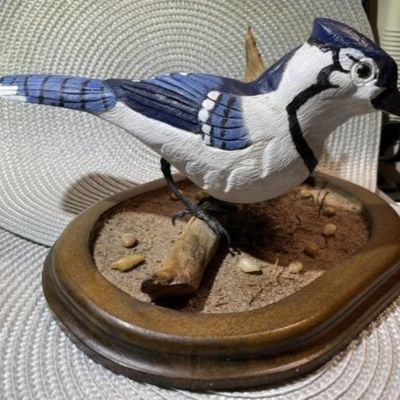 Sale Photo Thumbnail #261: Hand Carved & Hand Painted Signed by Artist BLUEJAY Wooden Bird on Driftwood with Custom Made Base Bird & Base are 9.5" Long Dated 1994. $15 DOMESTIC INHOUSE SHIPPING.