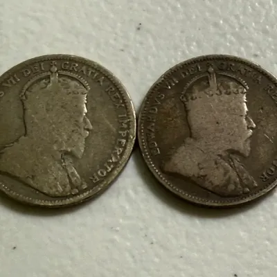 Sale Photo Thumbnail #557: SCARCE CANADA 1902 & 1902-H NICE CIRCULATED CONDITION 25-CENT SILVER COINS AS PICTURED. $5 DOMESTIC SHIPPING.