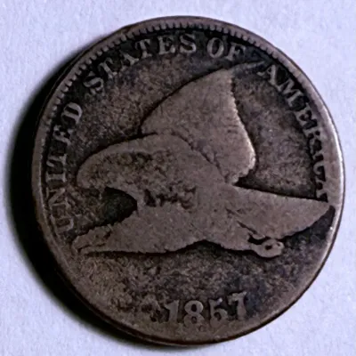 Sale Photo Thumbnail #562: 1857 GOOD CONDITION "CUD ON AMERICA" ERROR FLYING EAGLE CENT AS PICTURED. $5 DOMESTIC SHIPPING.