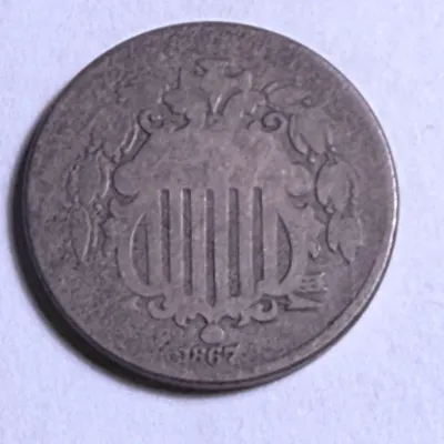 Sale Photo Thumbnail #567: 1867 AG/GOOD CONDITION "NO RAYS" SHIELD NICKEL TYPE COIN AS PICTURED. $5 DOMESTIC SHIPPING.