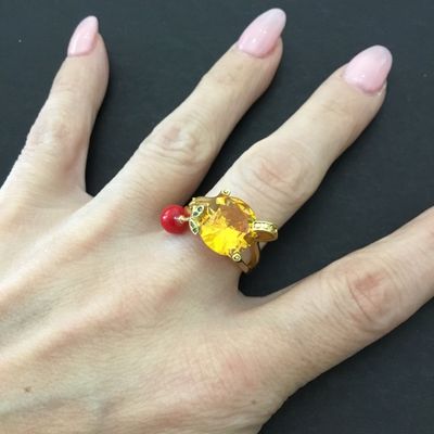 Gold tone, orange stone cocktail ring very pretty