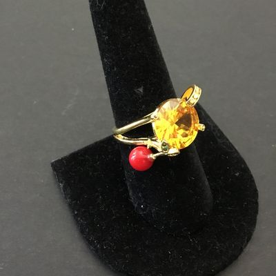 Gold tone, orange stone cocktail ring very pretty