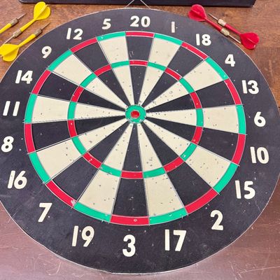 Sale Photo Thumbnail #282: Regulation tournament dart board on one side, Baseball dart game on the other. Includes 5 darts (missing a red dart).