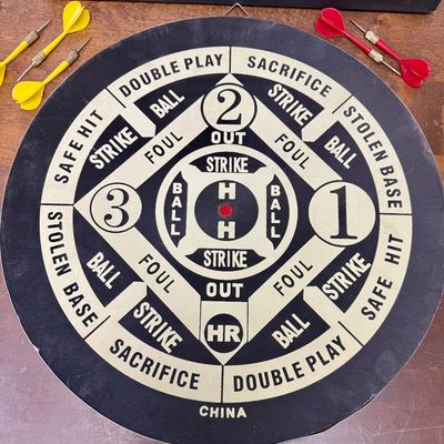 Sale Photo Thumbnail #283: Regulation tournament dart board on one side, Baseball dart game on the other. Includes 5 darts (missing a red dart).