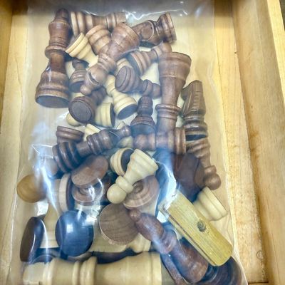 Sale Photo Thumbnail #114: Large size, pieces are 3"to 4" tall. Wooden board is approx. 18" x 18". and approx. 5" tall. Small drawer in the center to hold smaller game pieces, the chess pieces shown look to be from ChessHouse.com and have cloth storage bags.  There is an extra Quee