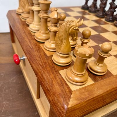 Sale Photo Thumbnail #105: Large size, pieces are 3"to 4" tall. Wooden board is approx. 18" x 18". and approx. 5" tall. Small drawer in the center to hold smaller game pieces, the chess pieces shown look to be from ChessHouse.com and have cloth storage bags.  There is an extra Quee