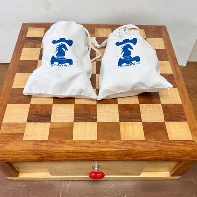 Sale Photo Thumbnail #112: Large size, pieces are 3"to 4" tall. Wooden board is approx. 18" x 18". and approx. 5" tall. Small drawer in the center to hold smaller game pieces, the chess pieces shown look to be from ChessHouse.com and have cloth storage bags.  There is an extra Quee