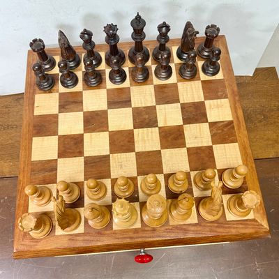 Sale Photo Thumbnail #110: Large size, pieces are 3"to 4" tall. Wooden board is approx. 18" x 18". and approx. 5" tall. Small drawer in the center to hold smaller game pieces, the chess pieces shown look to be from ChessHouse.com and have cloth storage bags.  There is an extra Quee
