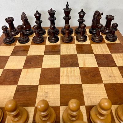 Sale Photo Thumbnail #108: Large size, pieces are 3"to 4" tall. Wooden board is approx. 18" x 18". and approx. 5" tall. Small drawer in the center to hold smaller game pieces, the chess pieces shown look to be from ChessHouse.com and have cloth storage bags.  There is an extra Quee