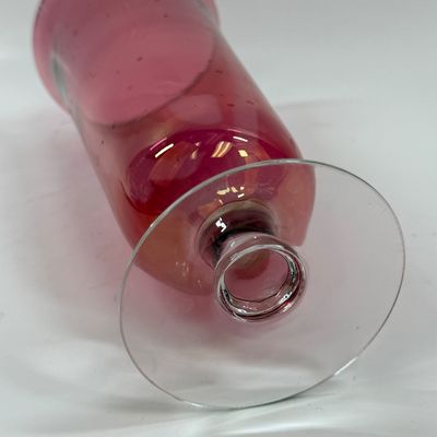 Sale Photo Thumbnail #116: Vintage ruby cranberry flash glass vase features a delicate white etched floral design. Good condition, approx. 10" tall.