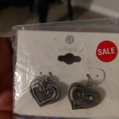 Metal Scroll Earrings from CJ Banks. Copper Colored