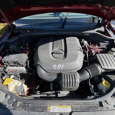 Sale Photo Thumbnail #5: 3.6 liter Pentastar V6, flex fuel capable, 290hp, five-speed automatic, four-wheel drive. Running at time of catalog. May need new battery. Mileage: 101,293. VIN: 1C4RJFAGXCC175197.