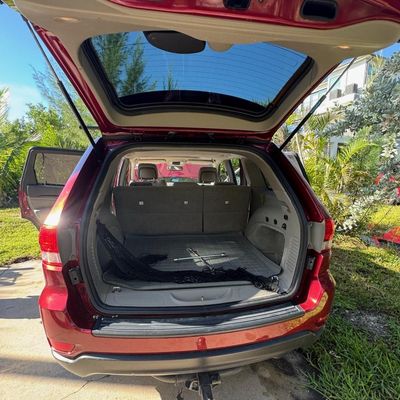 Sale Photo Thumbnail #11: 3.6 liter Pentastar V6, flex fuel capable, 290hp, five-speed automatic, four-wheel drive. Running at time of catalog. May need new battery. Mileage: 101,293. VIN: 1C4RJFAGXCC175197.