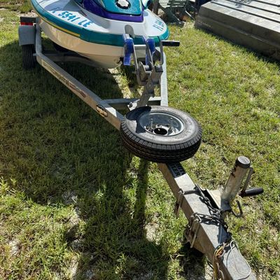 Sale Photo Thumbnail #88: Includes trailer. There is no title for the trailer. Not tested. Two-cylinder, two-stroke, 80hp, 710 cc. VIN: YAMA3866H596.