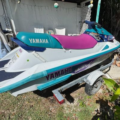 Sale Photo Thumbnail #108: Includes trailer. There is no title for the trailer. Model WVT700T. 701cc, 80hp. Not tested. VIN: YAMA1230D95. There is a minor scuff on the back.