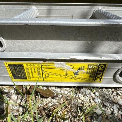 Sale Photo Thumbnail #120: This is a 24-foot aluminum extension ladder.