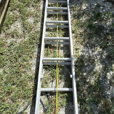 Sale Photo Thumbnail #118: This is a 24-foot aluminum extension ladder.