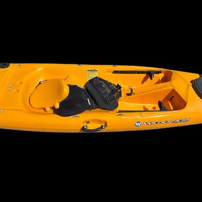 Sale Photo Thumbnail #127: Made by Wilderness Systems. This is a classic touring and fishing kayak, known for its speed and stability. Measurement: 16’L. General age related wear.
