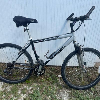 Sale Photo Thumbnail #139: Includes a Schwinn hybrid and a Specialized hybrid bicycle. Two bicycles. Age related wear.