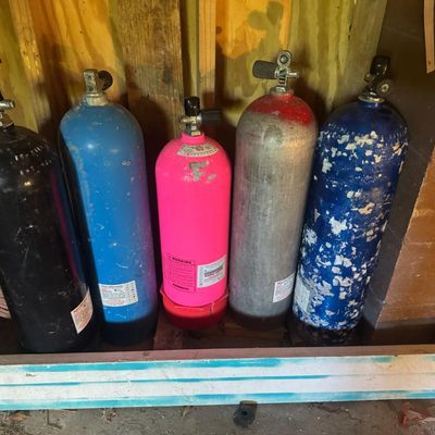Sale Photo Thumbnail #153: Includes tanks, flippers, buoys, and more. Age related wear.