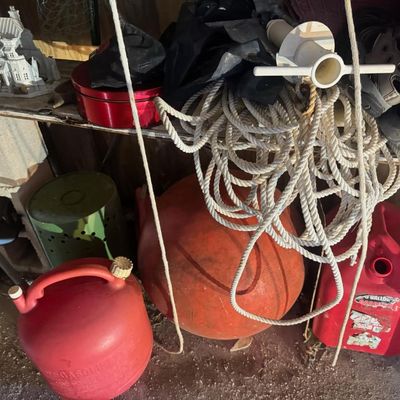 Sale Photo Thumbnail #168: Includes fuel cans, oars, bicycle helmets, fishing nets, and more.