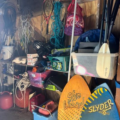 Sale Photo Thumbnail #164: Includes fuel cans, oars, bicycle helmets, fishing nets, and more.