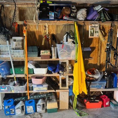 Sale Photo Thumbnail #170: Includes a car jack, cargo straps, a dive knife, fishing tackle, and more.