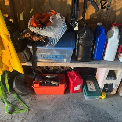 Sale Photo Thumbnail #175: Includes a car jack, cargo straps, a dive knife, fishing tackle, and more.