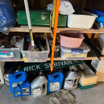 Sale Photo Thumbnail #171: Includes a car jack, cargo straps, a dive knife, fishing tackle, and more.