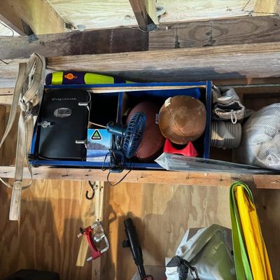 Sale Photo Thumbnail #178: Includes a car jack, cargo straps, a dive knife, fishing tackle, and more.
