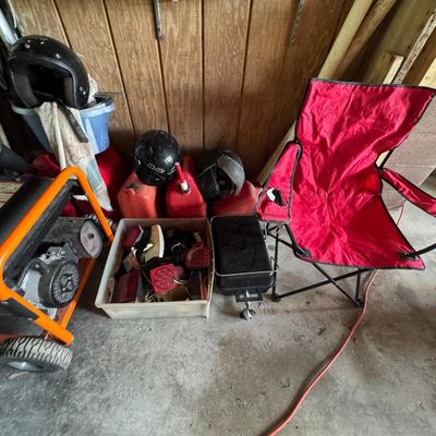 Sale Photo Thumbnail #214: Includes vintage water skis, golf clubs, a Generac GP5500 generator, gas cans, and more. The generator is running at the time of catalog.