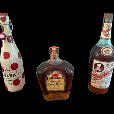 Sale Photo Thumbnail #218: Includes a Crown Royal bottle, a Lolea white sangria bottle, and a Yellowstone Kentucky straight bourbon bottle. Total of three collector bottles.