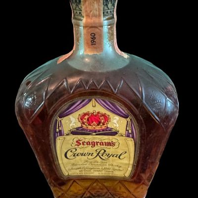 Sale Photo Thumbnail #222: Includes a Crown Royal bottle, a Lolea white sangria bottle, and a Yellowstone Kentucky straight bourbon bottle. Total of three collector bottles.